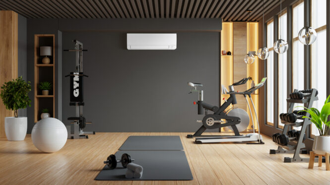 Modern gym interior with sport and fitness equipment on black wall background- 3D rendering